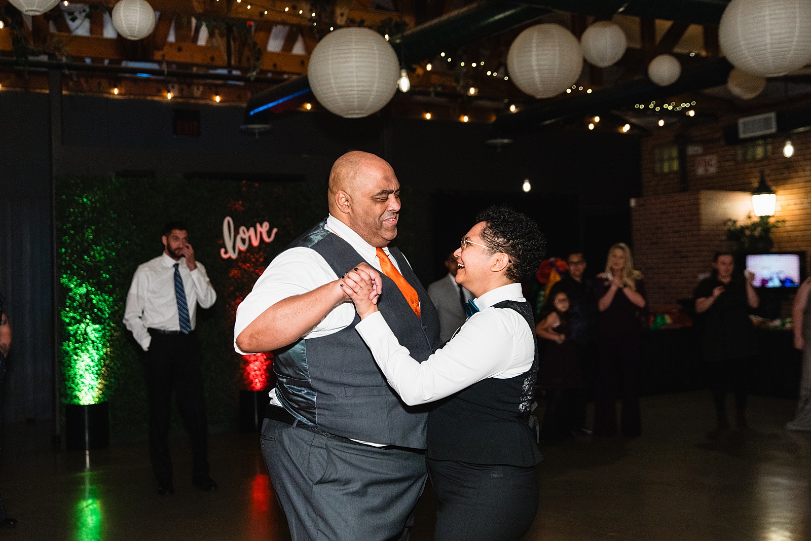 Bride dancing with her father at Regency Garden wedding reception by Mesa wedding photographer Juniper and Co Photography.