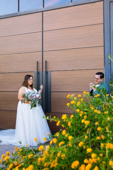 Newlyweds' first look at Phoenix desert intimate wedding by Phoenix wedding photographer Juniper and Co Photography.