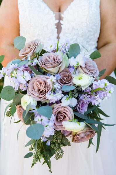 Bride's romantic blush purple bouquet by Juniper and Co Photography.
