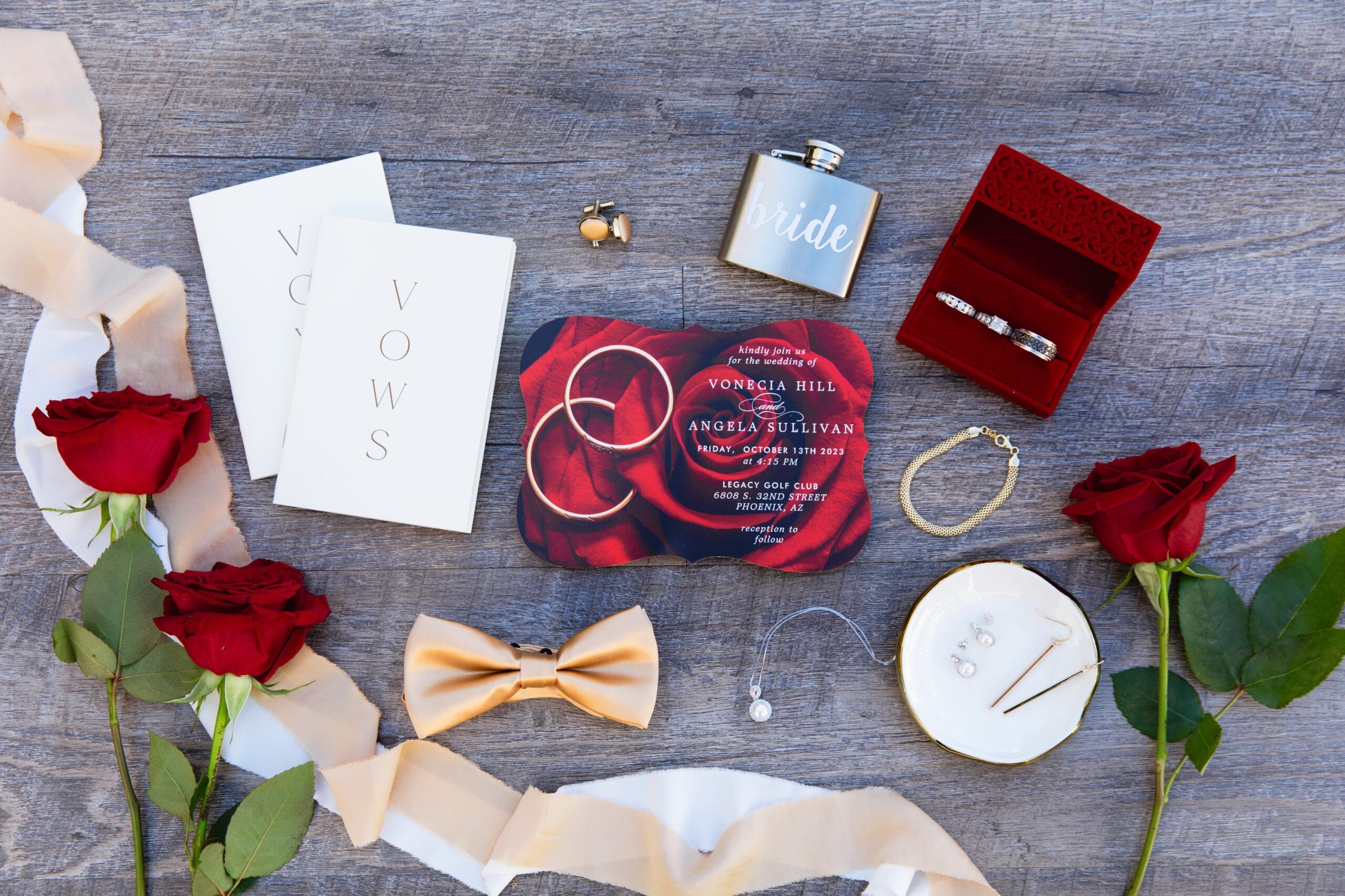 Couple's wedding day details of invitation, vows, rings and jewelry by Juniper and Co Photography.