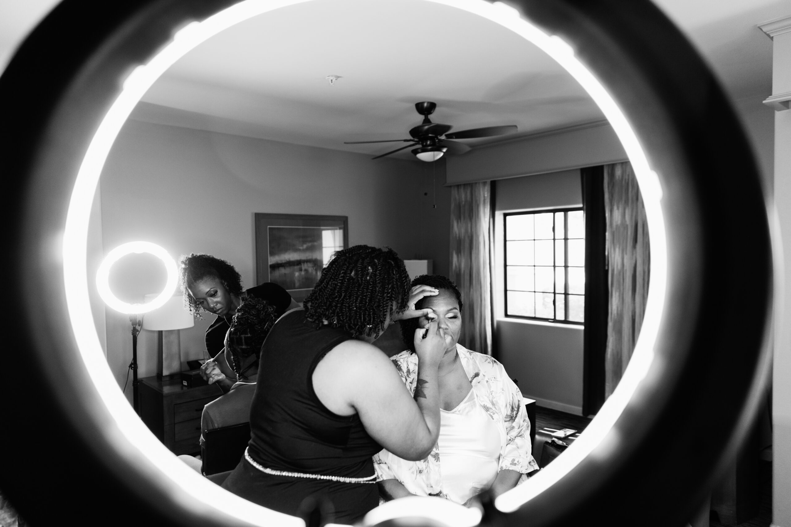 Bride getting ready for her wedding by Phoenix wedding photographers Juniper and Co Photography