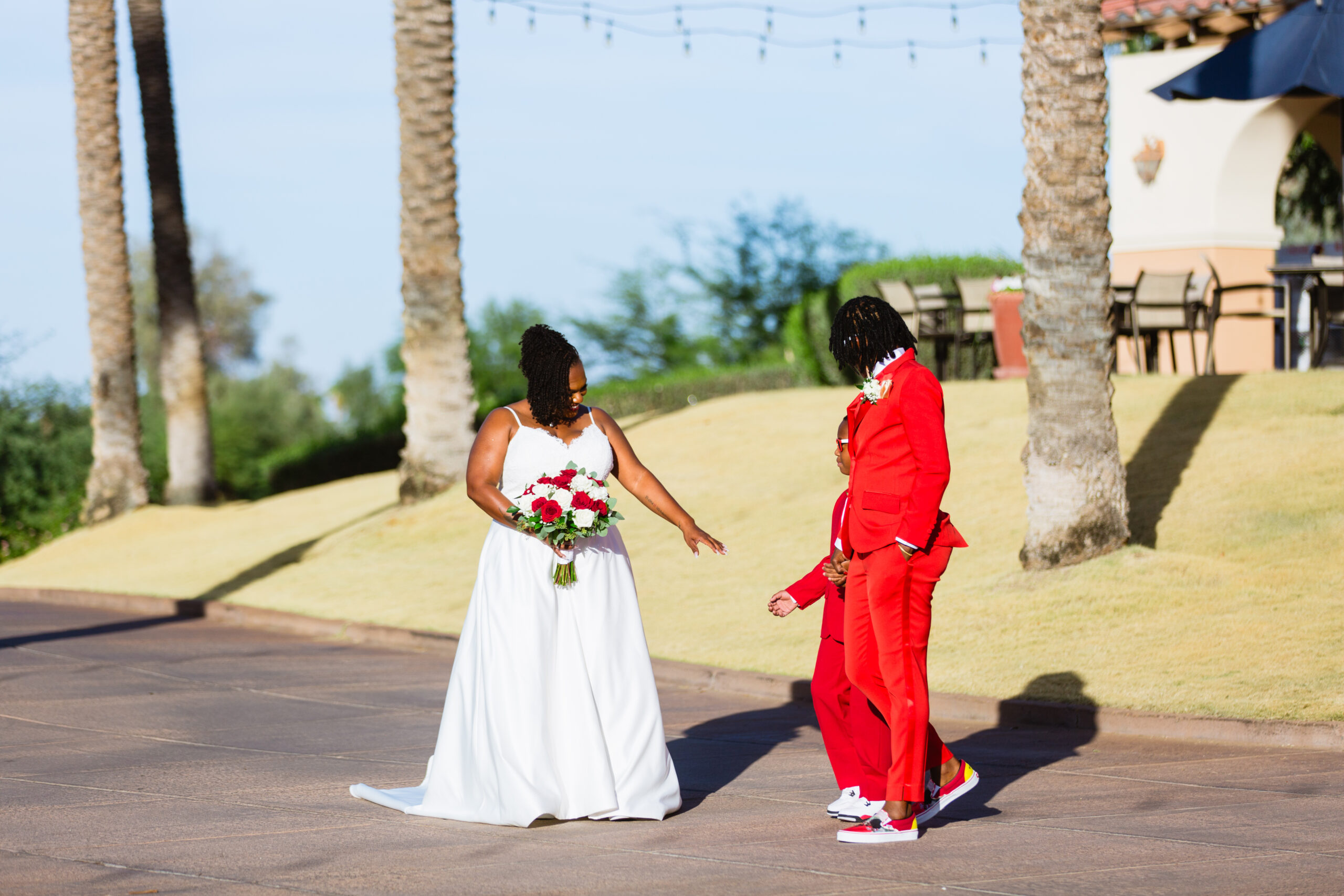 Bride and bride walk down the aisle by Juniper and Co Photography.