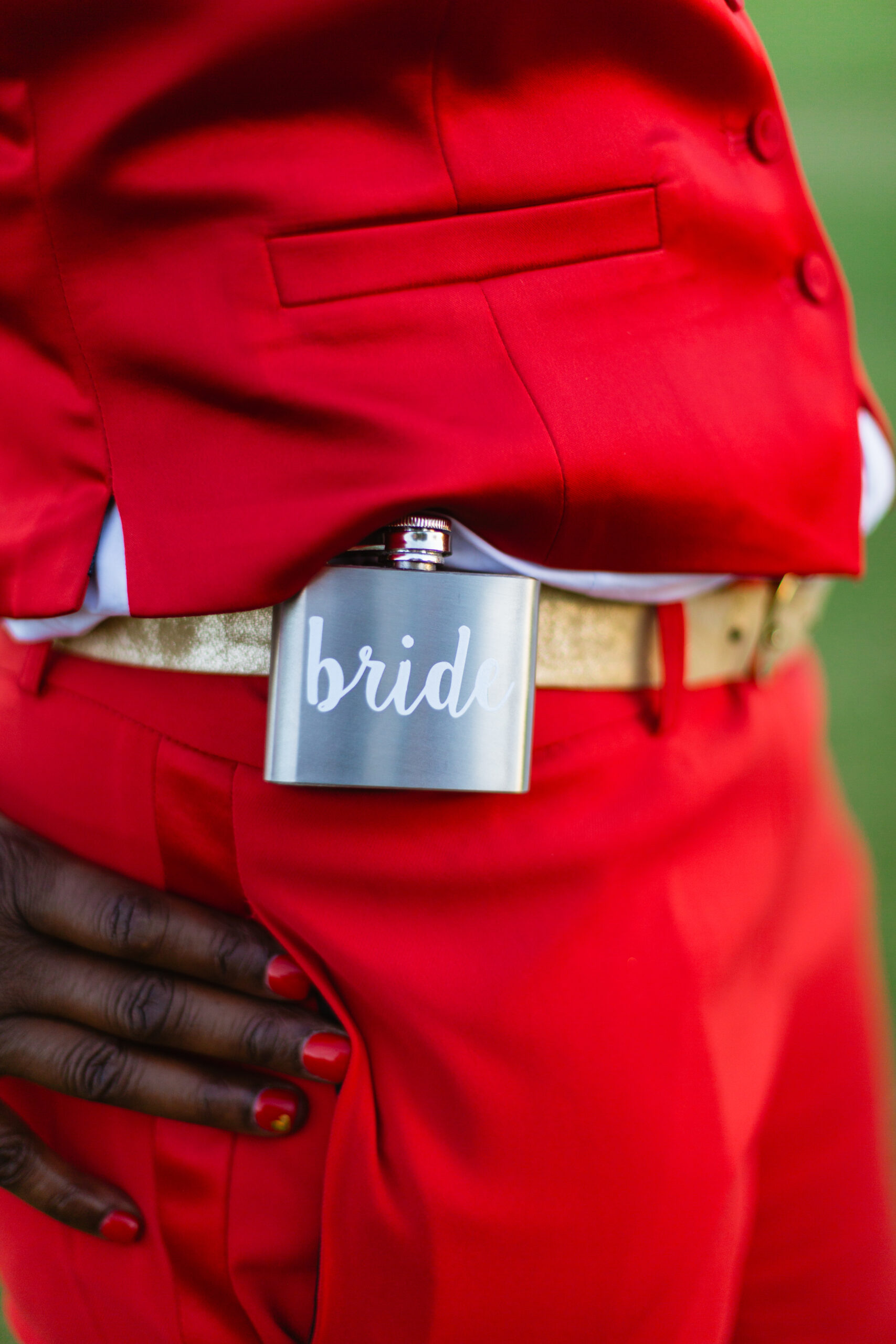 Detail image of bride's flask by Juniper and Co Photography.