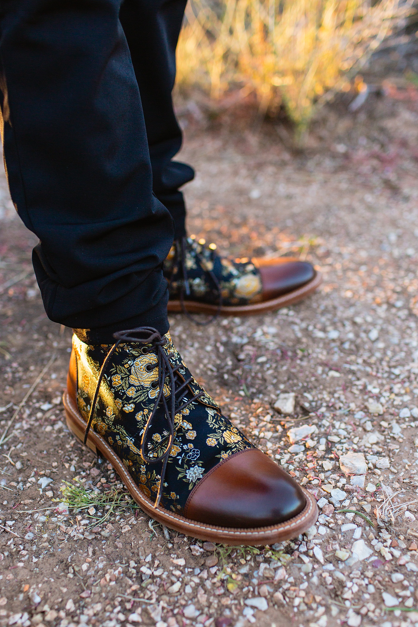 Groom's intricate and floral and leather shoes for his Grand Canyon elopement by Juniper and Co Photography.