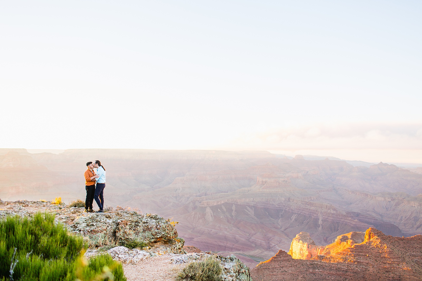 LGBTQ couple pose for their Grand Canyon elopement by Flagstaff elopement photographer Juniper and Co Photography.