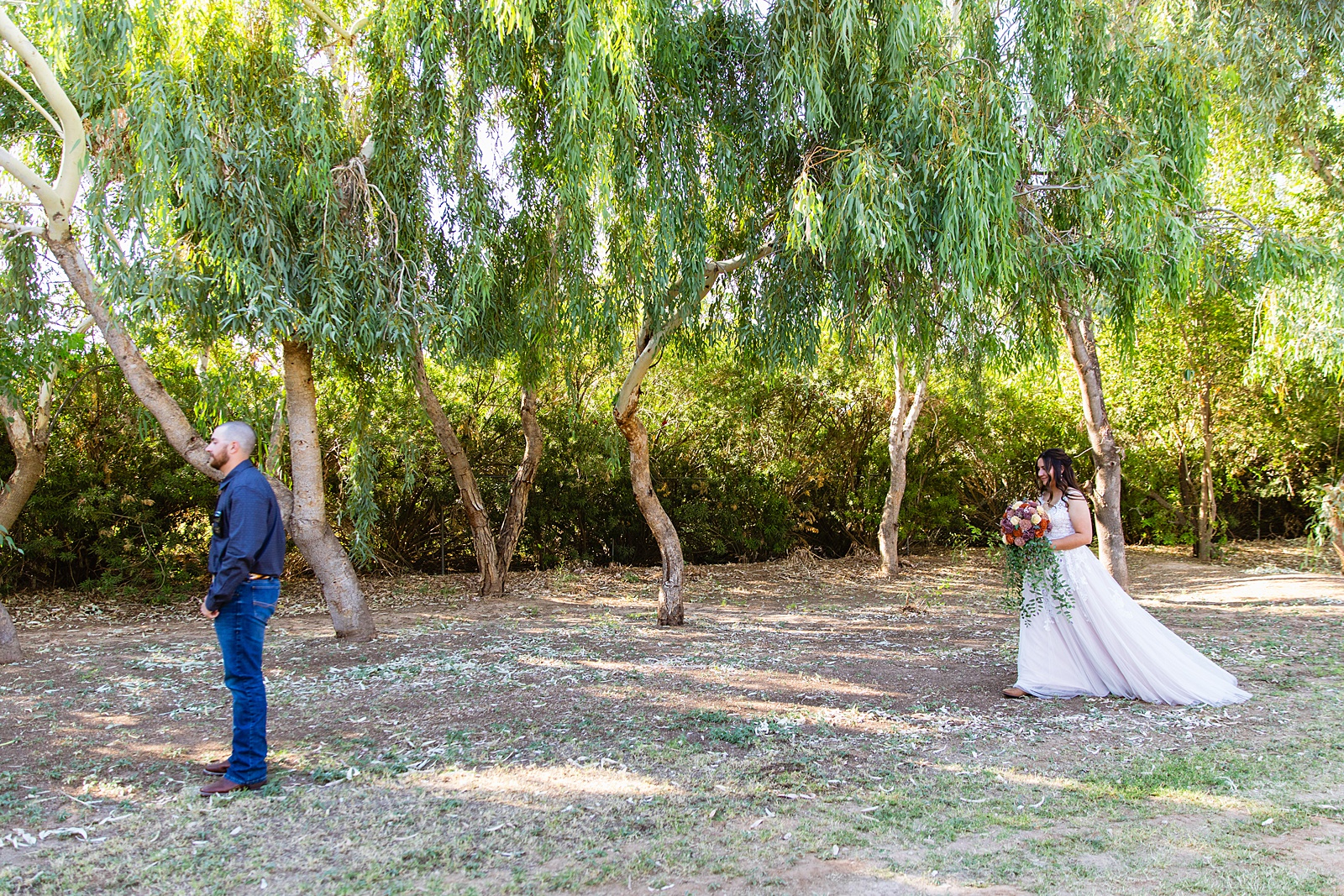 Bride & Groom's first look at intimate backyard wedding by Phoenix wedding photographer Juniper and Co Photography.