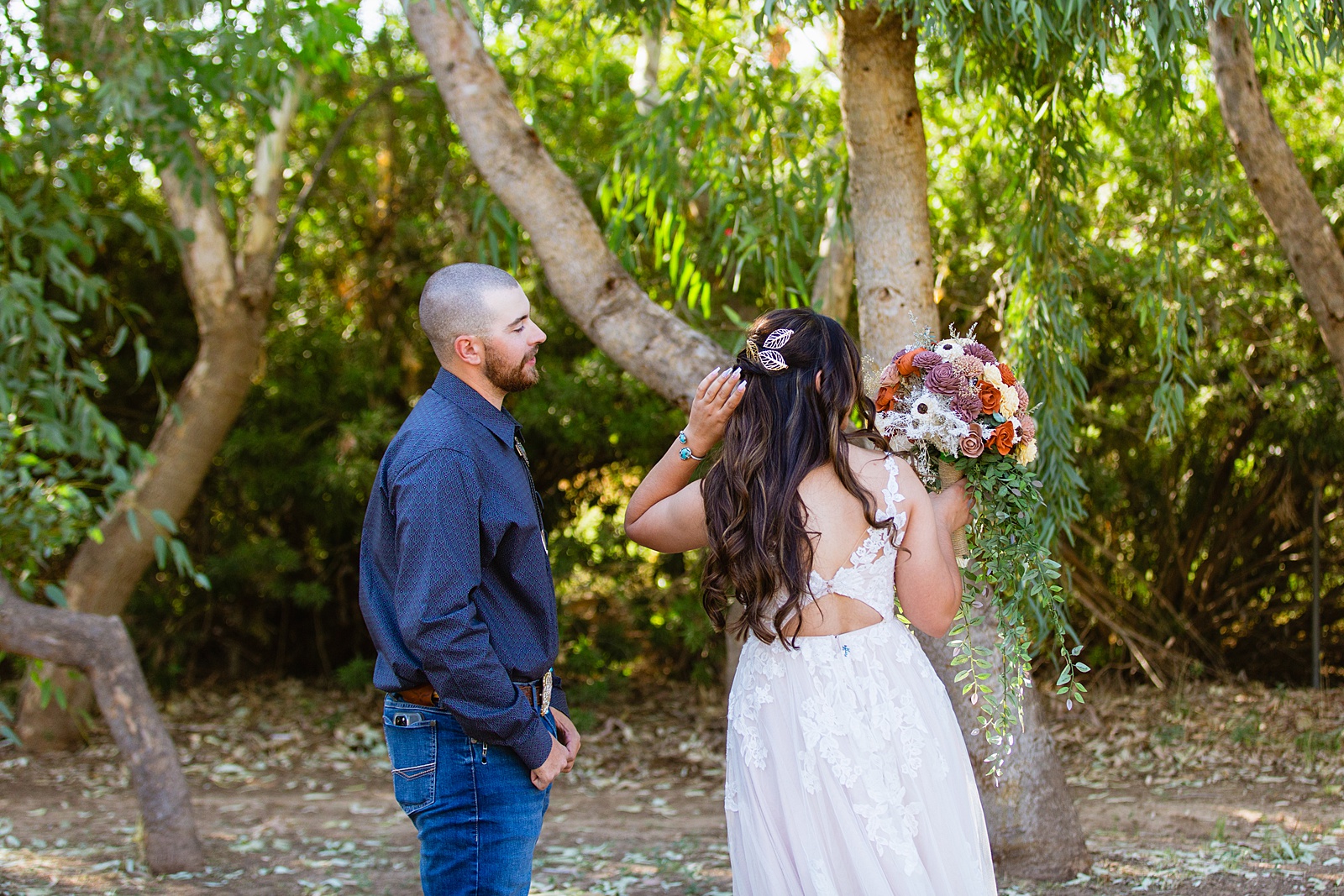 Bride & Groom's first look at intimate backyard wedding by Phoenix wedding photographer Juniper and Co Photography.