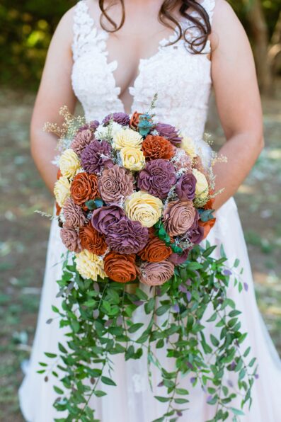 Bride's intricate paper bouquet by Juniper and Co Photography.