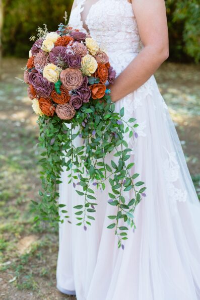 Bride's intricate paper bouquet by Juniper and Co Photography.