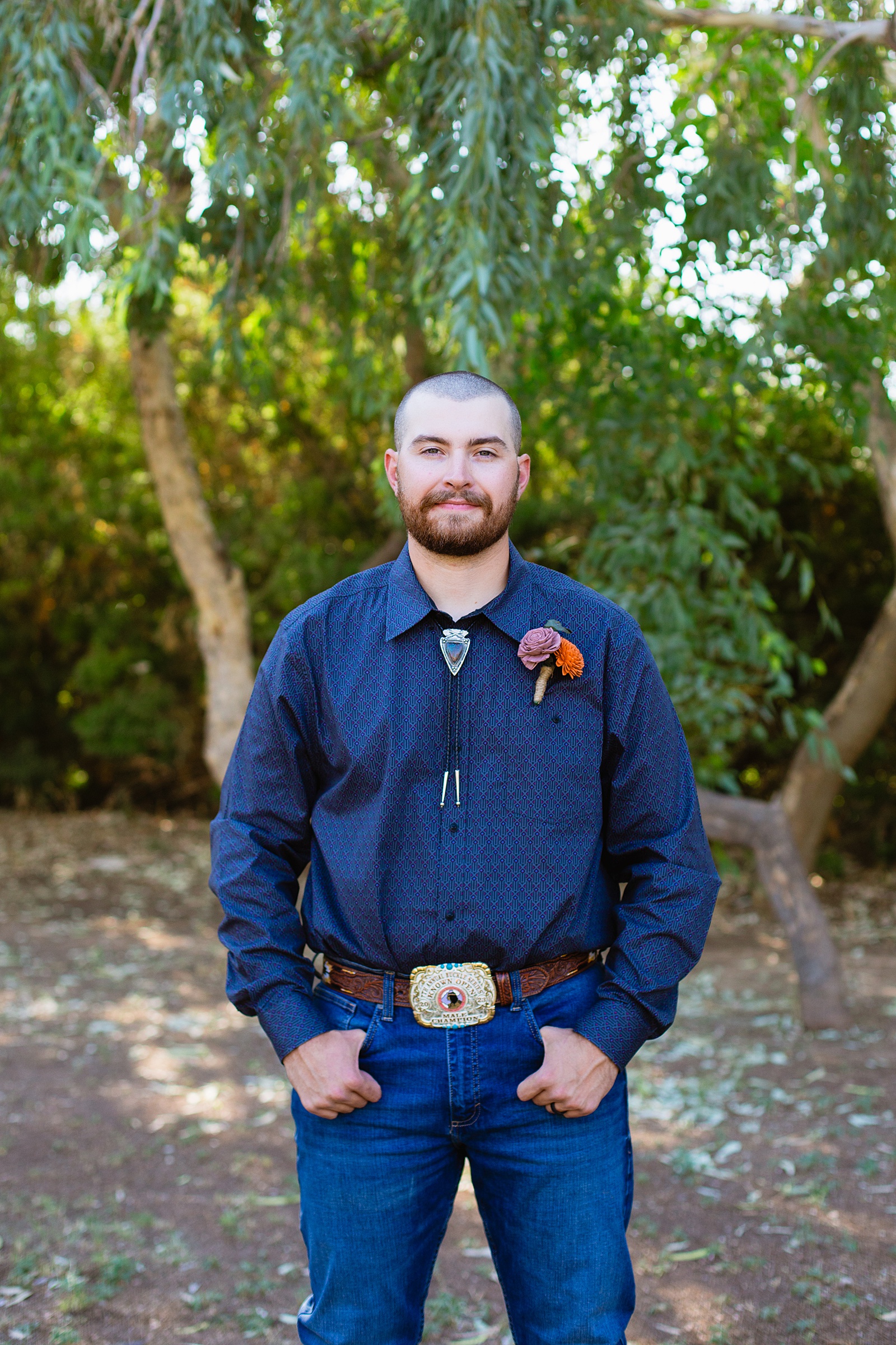 Groom's Southwestern outfit for his intimate backyard wedding by Juniper and Co Photography.