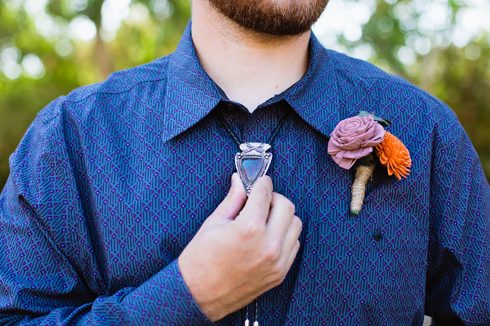 Groom's arrowhead and stone bolo tie by Juniper and Co Photography.