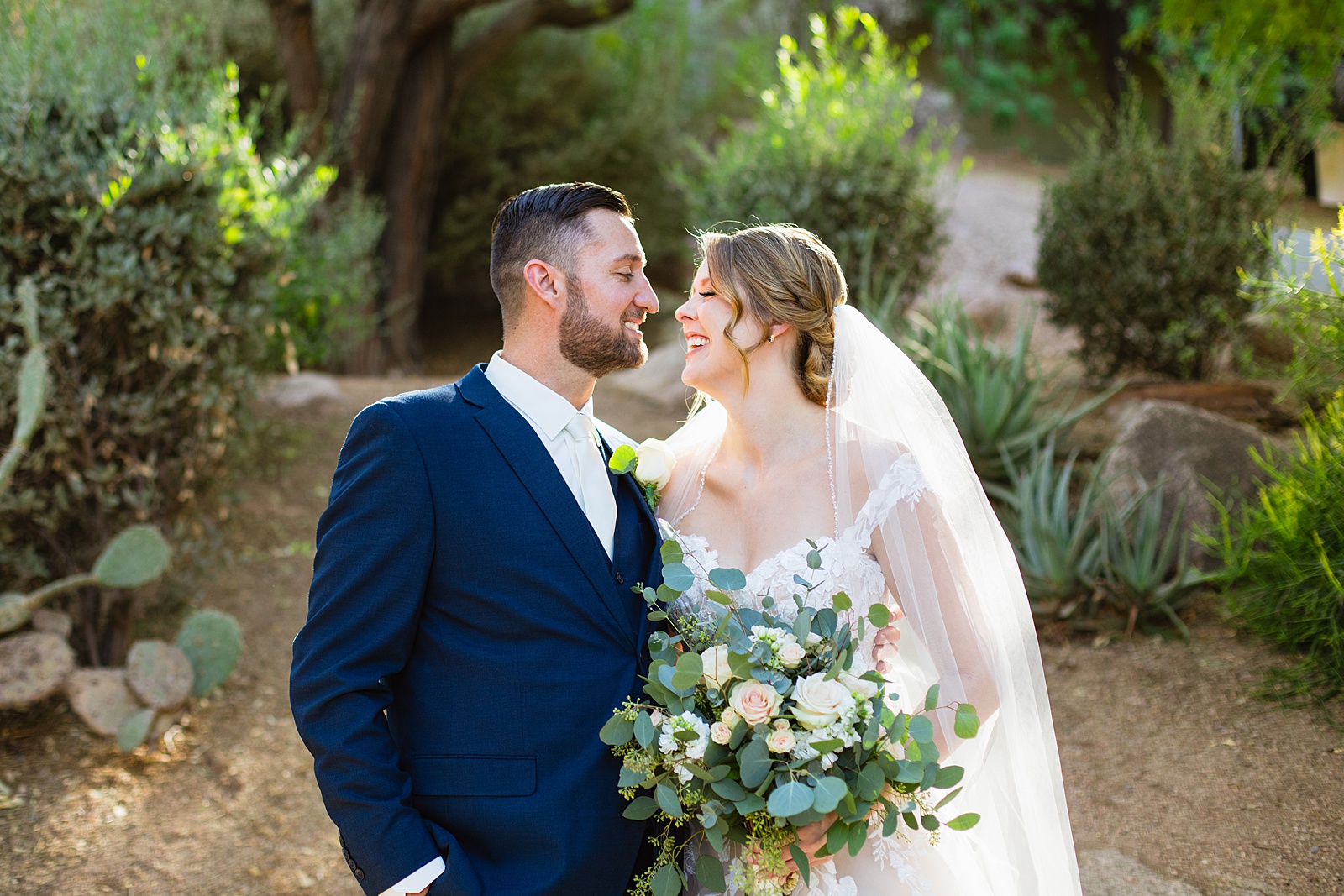 Bride & Groom share an intimate moment at their Sanctuary wedding by Arizona wedding photographer Juniper and Co Photography.