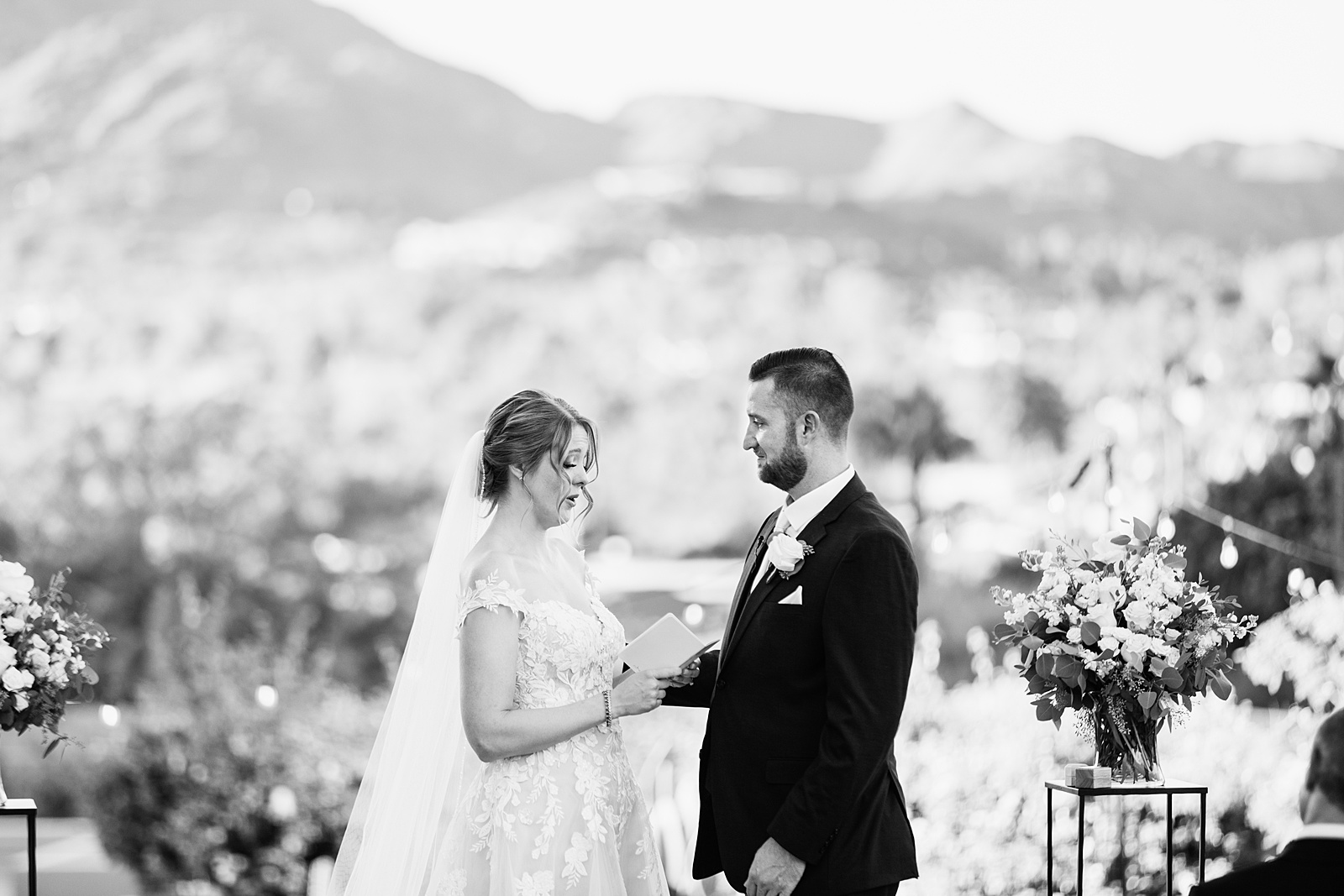 Bride & Groom exchange vows during their Sanctuary wedding ceremony by Phoenix wedding photographer Juniper and Co Photography.