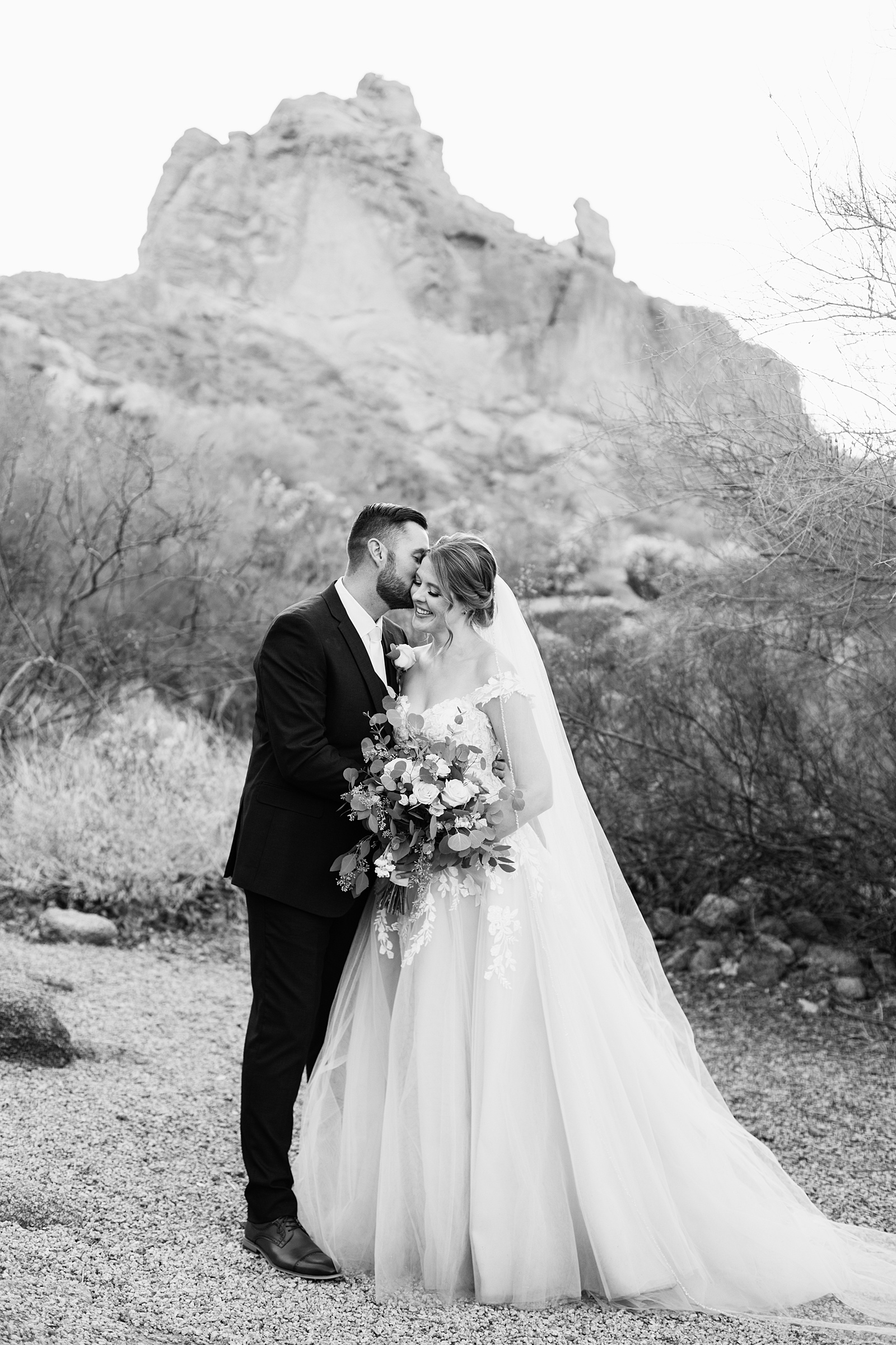 Bride & Groom share an intimate moment during their Sanctuary wedding by Phoenix wedding photographer Juniper and Co Photography.