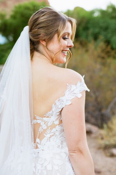 Bride's off the shoulder vine inspired wedding dress for her Sanctuary at Camelback wedding by Juniper and Co Photography.