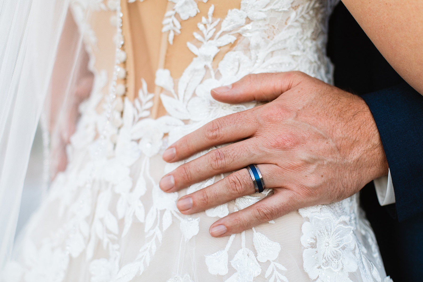 Detail image of wedding rings by Juniper and Co Photography.