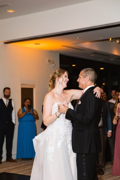 Bride dancing with her father at Sanctuary at Camelback wedding reception by Phoenix wedding photographer Juniper and Co Photography.