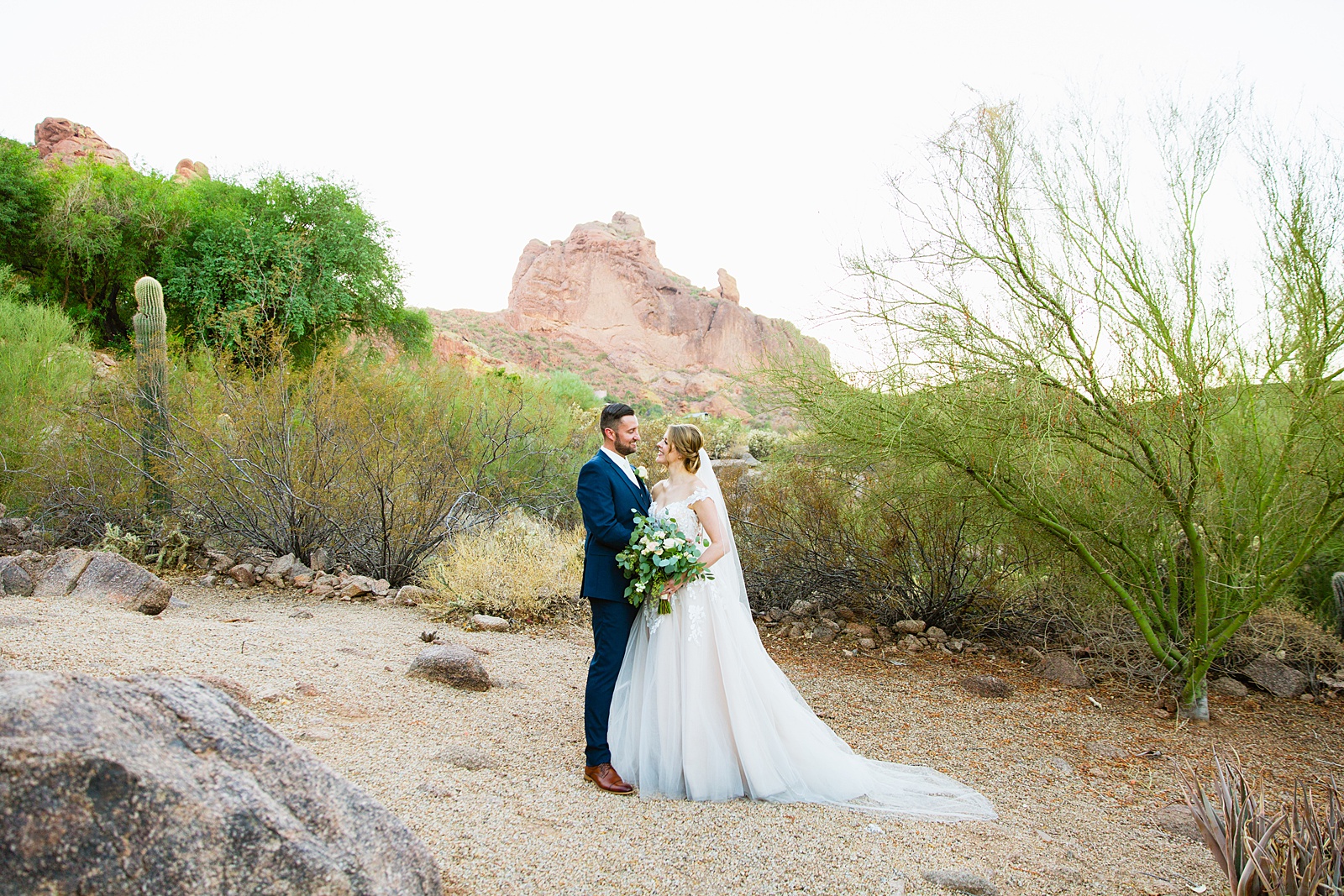 Bride & Groom together during Sanctuary at Camelback wedding ceremony by Phoenix wedding photographer Juniper and Co Photography.