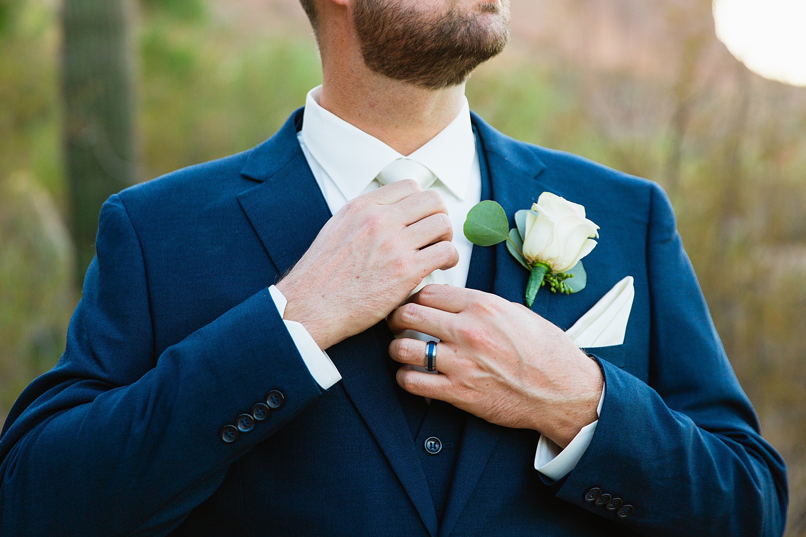 Groom's dark blue suit for his Sanctuary at Camelback wedding by Juniper and Co Photography.