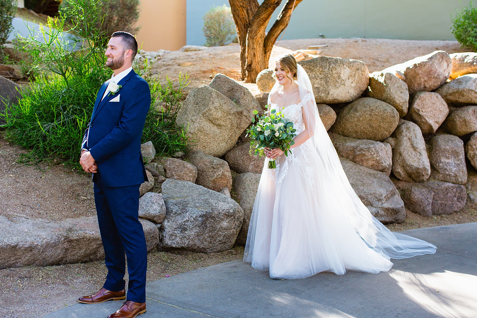 Bride & Groom's first look at Sanctuary at Camelback by Phoenix wedding photographer Juniper and Co Photography.